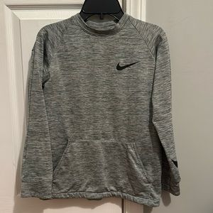 Youth medium Nike fleece lined pullover. Great for running. Fleece lined.